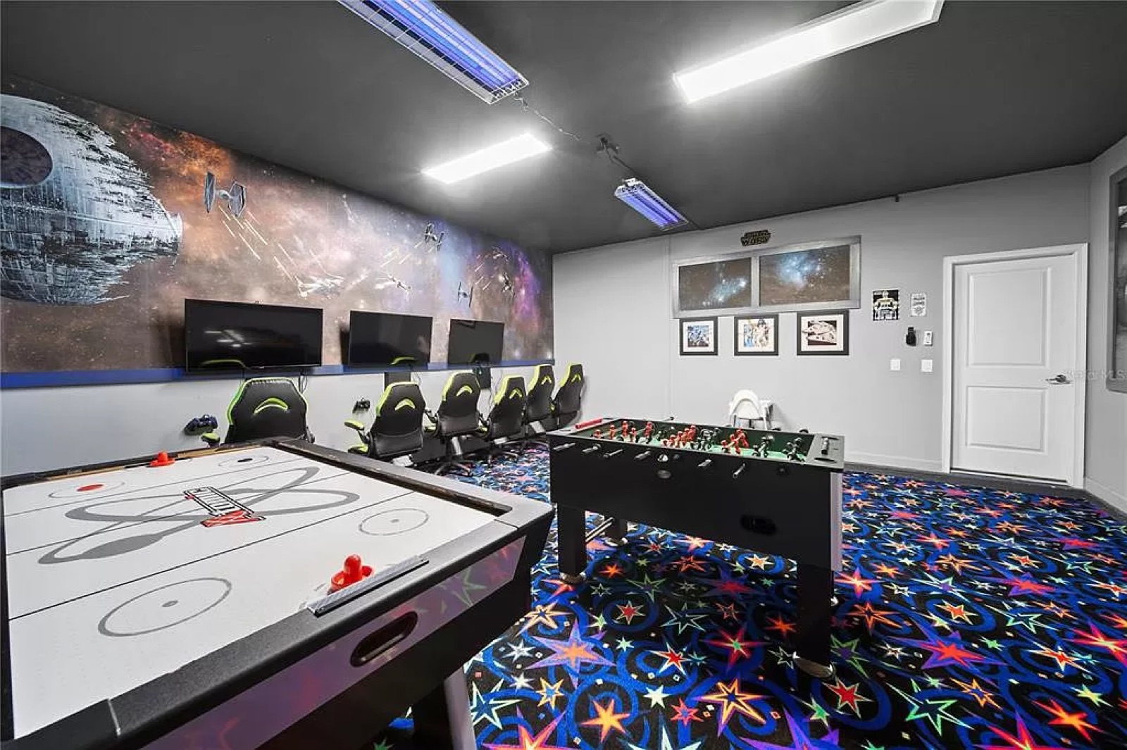 Arcade room with air hockey and foosball